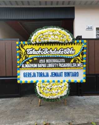 Papan Bunga Duka di Aik Mual